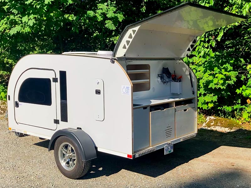 DROPLET XL teardrop camper comes with a bigger fridge and additional shelves.