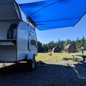 A Shady Boy awning covers a large 10ft by 6 ft area on the side of a teardrop trailer.